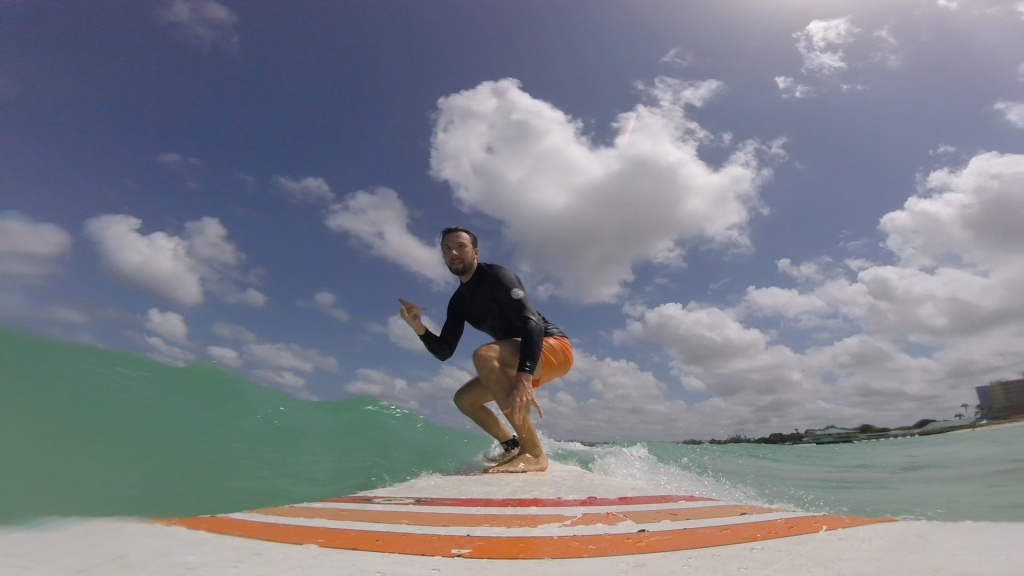Man surfing with Ride the Tide GoPro front Mounts